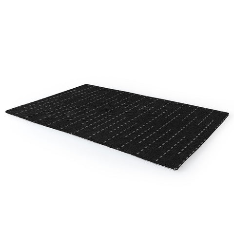 Little Arrow Design Co running stitch charcoal Area Rug