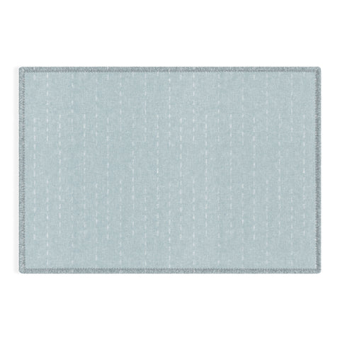 Little Arrow Design Co running stitch coastal blue Outdoor Rug