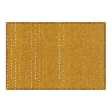 Little Arrow Design Co running stitch gold Outdoor Rug