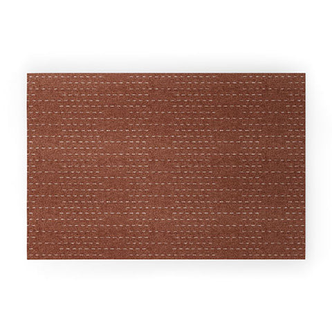 Little Arrow Design Co running stitch rust Welcome Mat