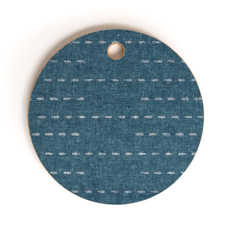 Little Arrow Design Co running stitch stone blue Cutting Board Round
