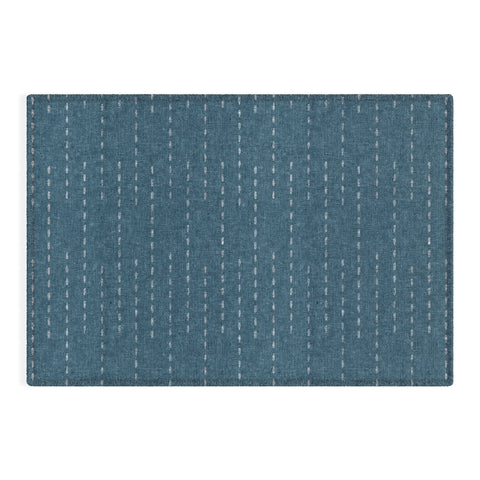 Little Arrow Design Co running stitch stone blue Outdoor Rug
