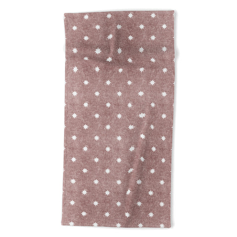 Little Arrow Design Co stars on mauve Beach Towel