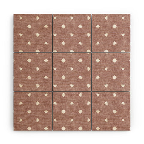 Little Arrow Design Co stars on mauve Wood Wall Mural