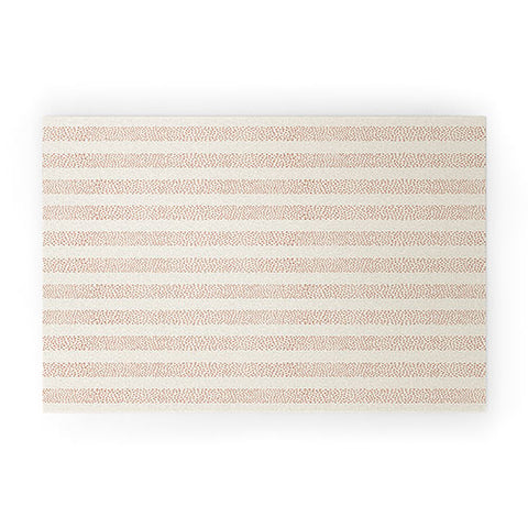 Little Arrow Design Co stippled stripes cream orange Welcome Mat