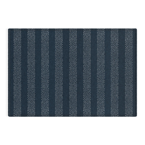 Little Arrow Design Co stippled stripes navy blue Outdoor Rug