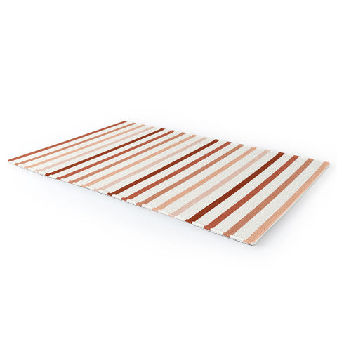 Little Arrow Design Co terra cotta stripes Area Rug