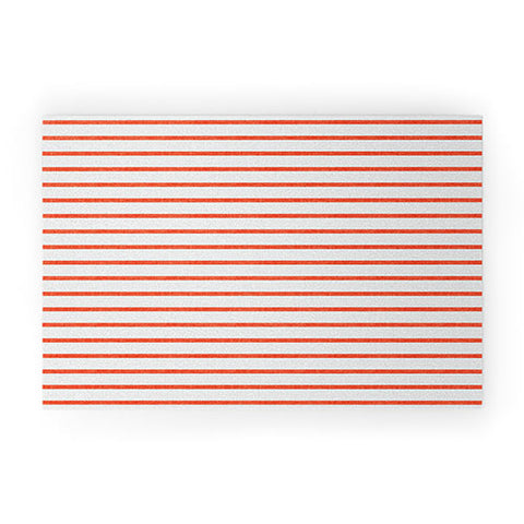 Little Arrow Design Co thin orange stripes Welcome Mat
