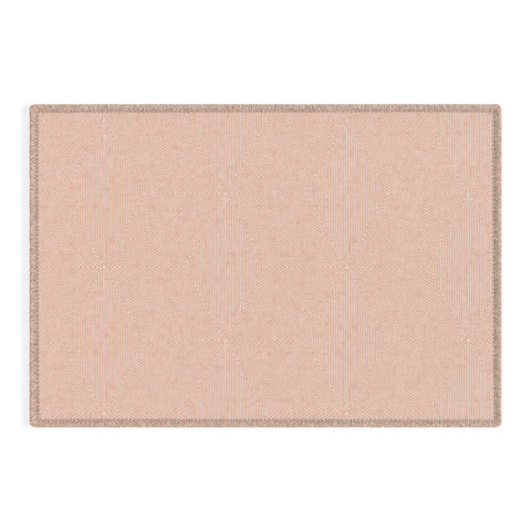 Little Arrow Design Co triangle stripes peach Outdoor Rug