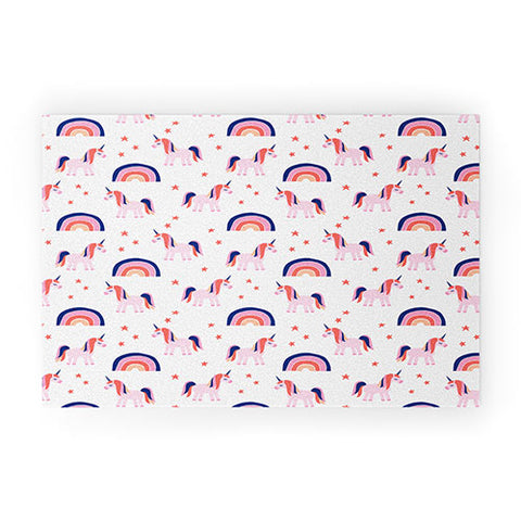 Little Arrow Design Co unicorn dreams in pink and blue Welcome Mat
