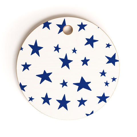 Little Arrow Design Co unicorn dreams stars in blue Cutting Board Round