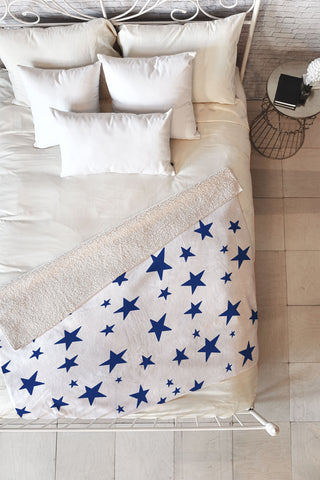 Little Arrow Design Co unicorn dreams stars in blue Fleece Throw Blanket