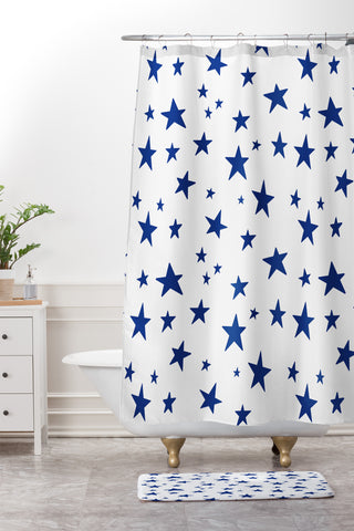 Little Arrow Design Co unicorn dreams stars in blue Shower Curtain And Mat
