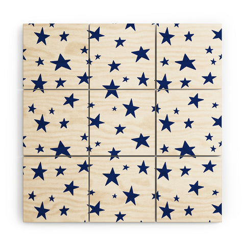 Little Arrow Design Co unicorn dreams stars in blue Wood Wall Mural