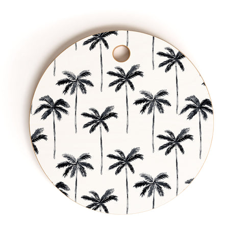 Little Arrow Design Co watercolor palm tree in black Cutting Board Round