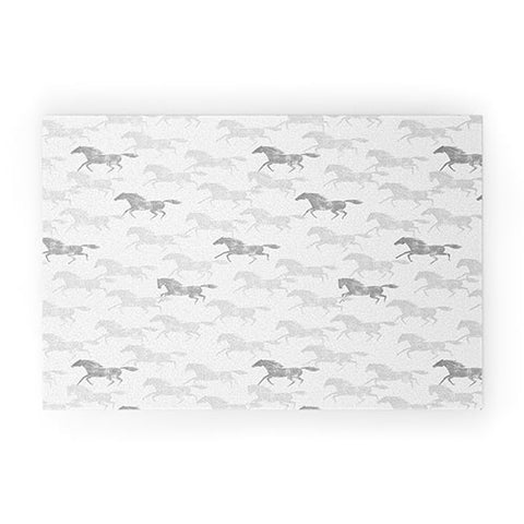 Little Arrow Design Co wild horses gray Welcome Mat