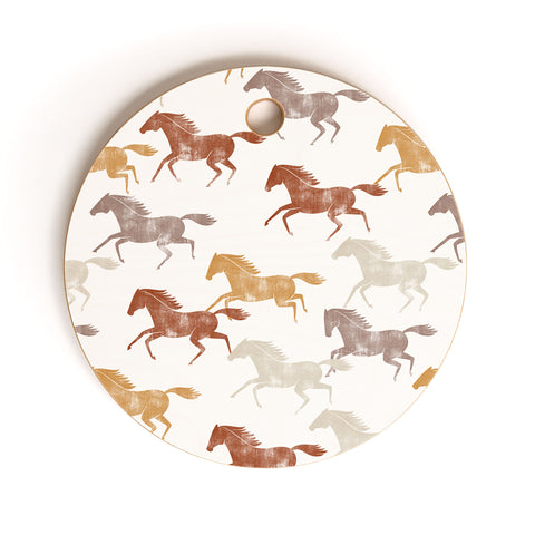 Little Arrow Design Co wild horses orange Cutting Board Round