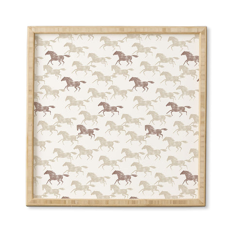 Little Arrow Design Co wild horses tan Framed Wall Art