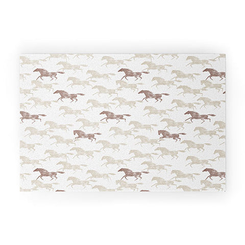 Little Arrow Design Co wild horses tan Welcome Mat
