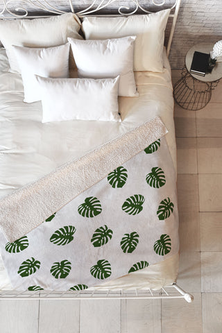 Little Arrow Design Co Woven Monstera in Green Fleece Throw Blanket