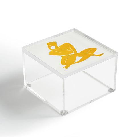 Little Dean Nude sitting in yellow Acrylic Box