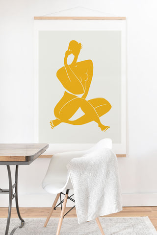 Little Dean Nude sitting in yellow Art Print And Hanger