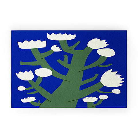 Little Dean White flower in blue Welcome Mat
