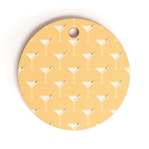 Lyman Creative Co Martini with Olives on Yellow Cutting Board Round