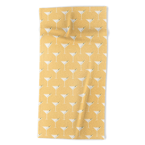 Lyman Creative Co Martini with Olives on Yellow Beach Towel