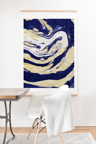 Marta Barragan Camarasa Abstract painting of blue and golden waves Art Print And Hanger