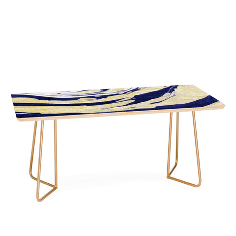 Marta Barragan Camarasa Abstract painting of blue and golden waves Coffee Table