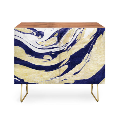 Marta Barragan Camarasa Abstract painting of blue and golden waves Credenza
