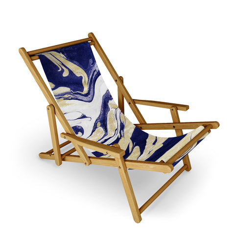 Marta Barragan Camarasa Abstract painting of blue and golden waves Sling Chair