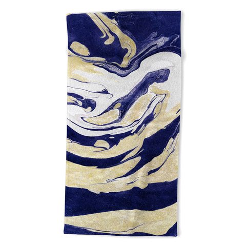 Marta Barragan Camarasa Abstract painting of blue and golden waves Beach Towel