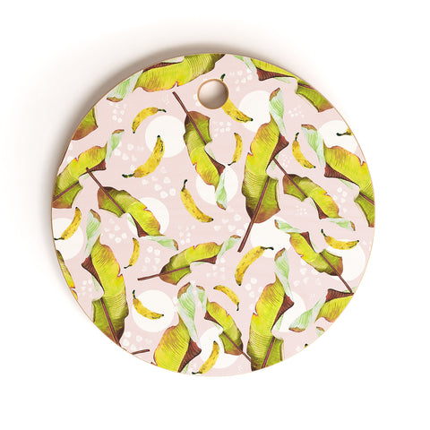 Marta Barragan Camarasa Banana leaf and bananas Cutting Board Round