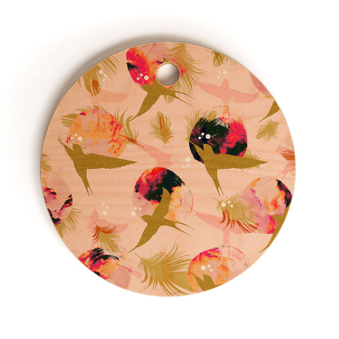Marta Barragan Camarasa Bird flying with sunset and feathers Cutting Board Round