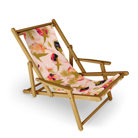 Marta Barragan Camarasa Bird flying with sunset and feathers Sling Chair