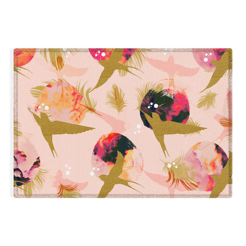 Marta Barragan Camarasa Bird flying with sunset and feathers Outdoor Rug