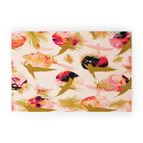 Marta Barragan Camarasa Bird flying with sunset and feathers Welcome Mat