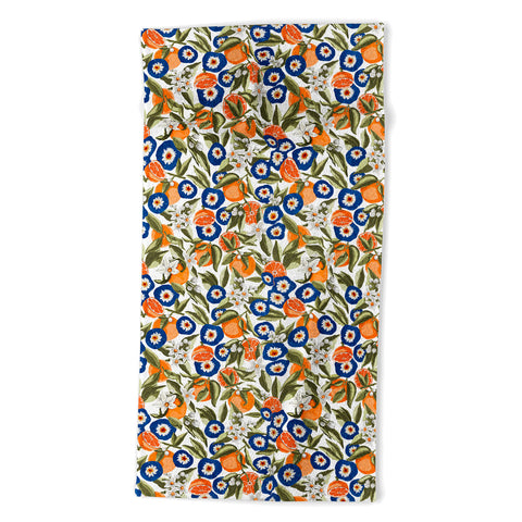 Marta Barragan Camarasa Blue flowers on orange B Beach Towel