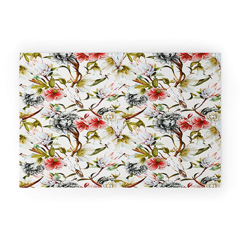 Marta Barragan Camarasa Boho skulls blooming in the garden Welcome Mat