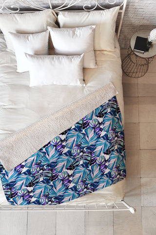 Marta Barragan Camarasa Exotic leaf pattern purple and blue Fleece Throw Blanket