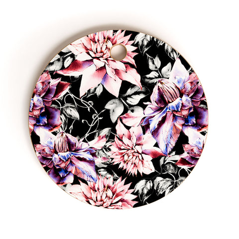 Marta Barragan Camarasa Pink bloom in the dark Cutting Board Round