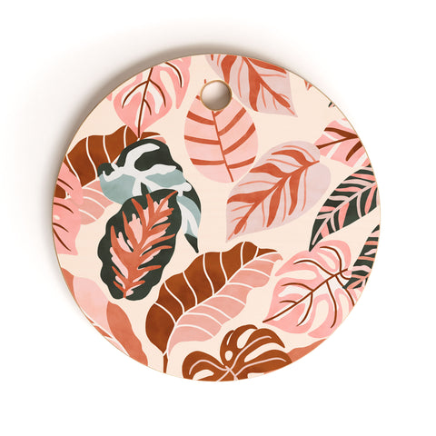 Marta Barragan Camarasa Pink tropical jungle leaves Cutting Board Round