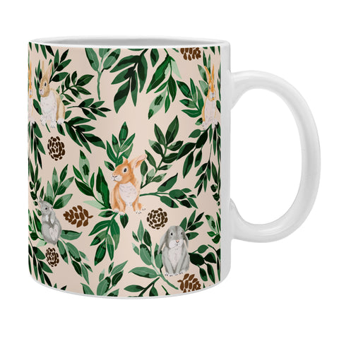 Marta Barragan Camarasa Rabbits in the green forest Coffee Mug