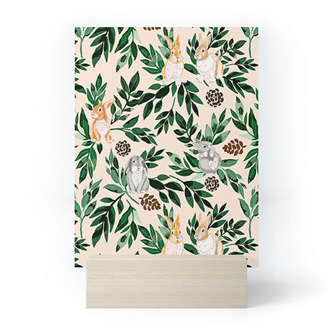 Marta Barragan Camarasa Rabbits in the green forest Mini Art Print