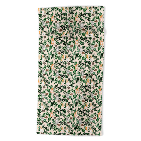 Marta Barragan Camarasa Rabbits in the green forest Beach Towel