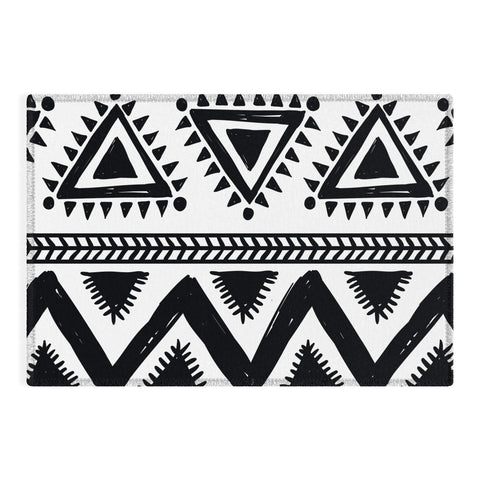 Marta Barragan Camarasa Tribal black and white Outdoor Rug