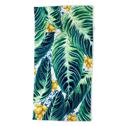 Marta Barragan Camarasa Tropical leaf on ornamental pattern Beach Towel