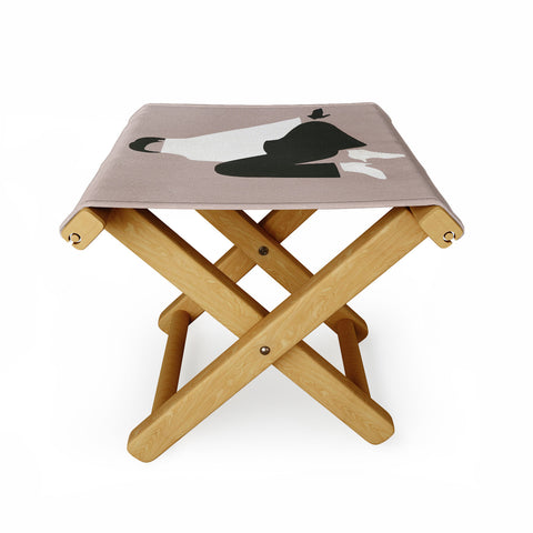 Megan Galante Minimalist woman in boots Folding Stool